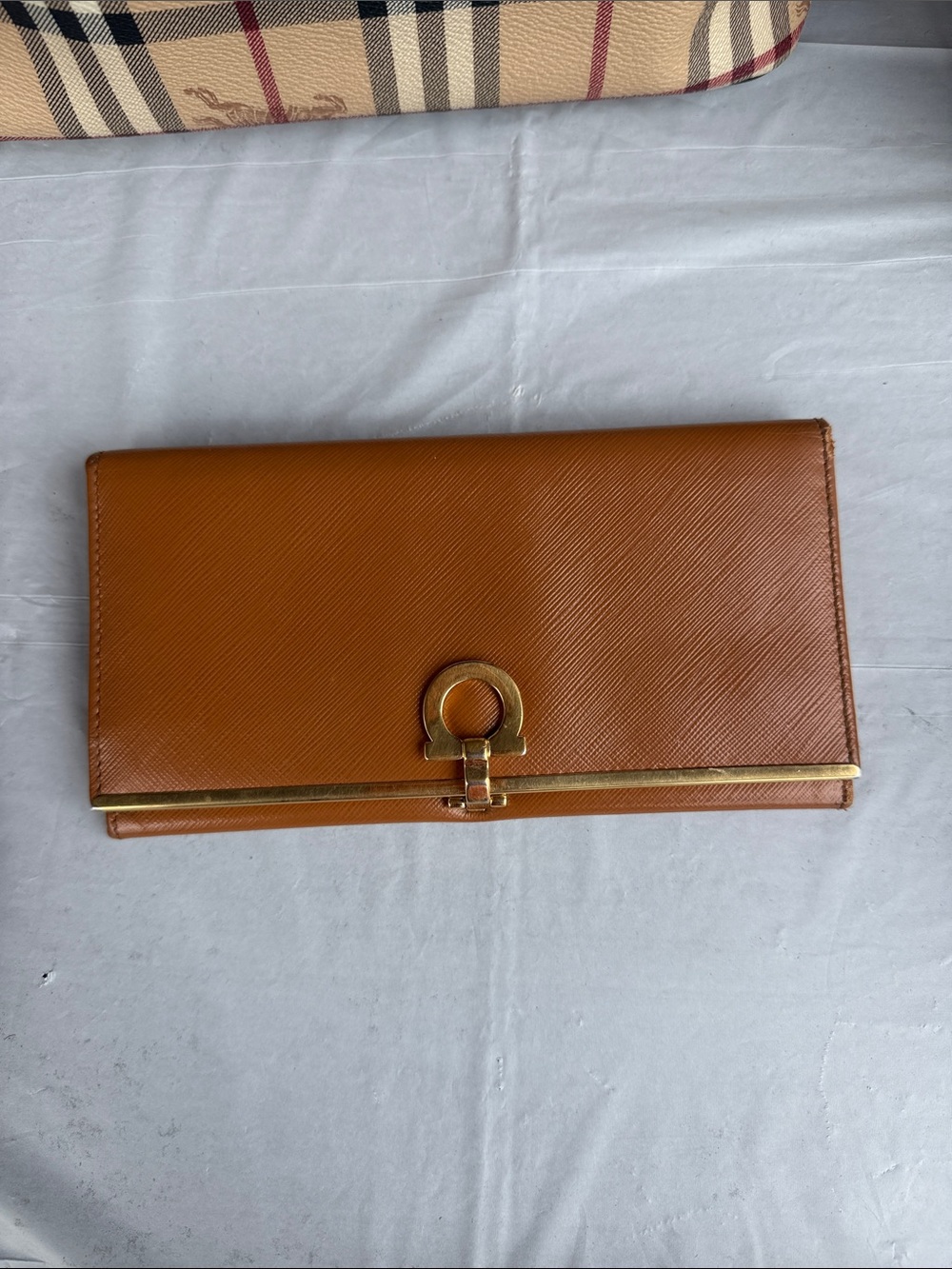 Salvatore Ferragamo Tan Leather Clutch with Gold Hardware